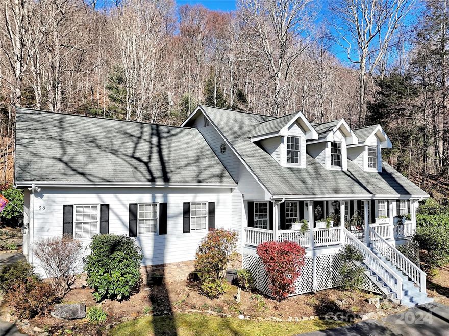 BRING BACKUPS! This exquisite home is set on 3 private acres in the Gated Community of The Villages of Plott Creek. It is surrounded by mature seasonal landscaping changing with the seasons and extensive rock walls. As you enter from the expansive Veranda, you will be taken by the elegance and comfort of the open floor plan. Beautiful hardwood floors and windows all around flood the area with natural light. The comfortable living room features a stone, WB fireplace with two sets of French Doors that open to the large deck. The well-designed open kitchen features granite counters, SS appliances, plenty of cabinets, a coffee bar, and eat-in nook surrounded by windows. The spacious Primary Bedroom Suite on the main floor features a Palladium Window, luxurious bath, W/I Closet. The office features wood built-ins. The Upper level has 2BD/1BA, along with a huge Family Room and Bonus Room. In the backyard, there is a Gazebo and a Potting Shed, both with lighting and electrical outlets.