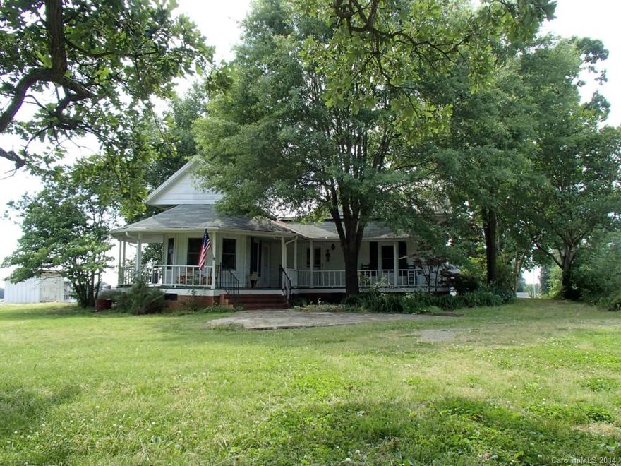 Once in a lifetime opportunity to own a piece of history while enjoying country living. Old world charm meets today's modern conveniences w/new windows, updated plumbing & electrical. Original flooring, ceilings, woodwork tells a story of days gone by.  Sip some lemonade on the wraparound porch & watch the sunset. 3 fireplaces in the home: kitchen & living room, and 2nd bedroom/den. Note: the floors are not perfectly pitched, and that is ok; it's been checked over by 3 different contractors!