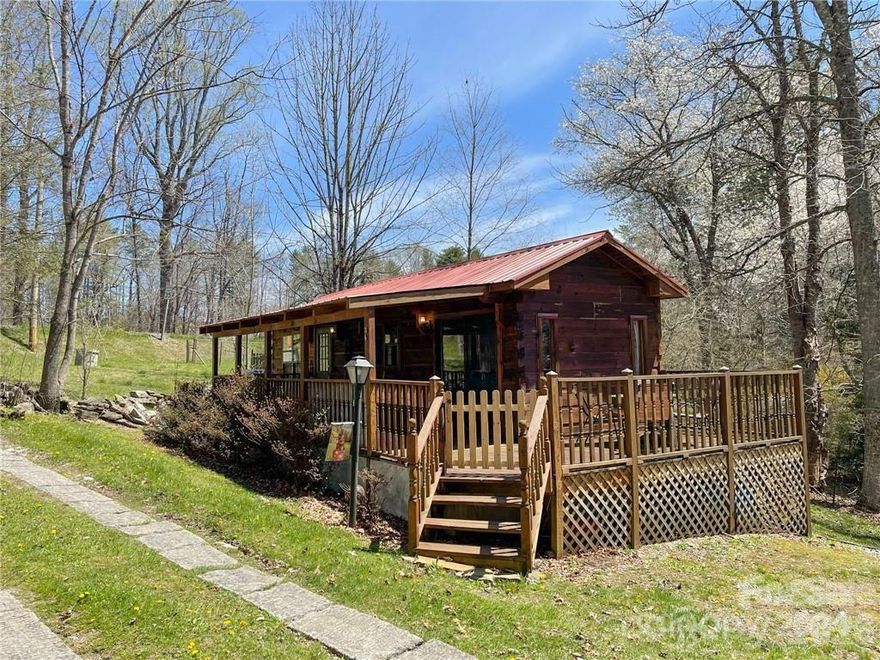 Cash-Only Sale. No Loans due to it being a park model home. The perfect place to get away awaits in the Linville Falls community of Avery County with a short drive to the Blue Ridge Parkway and the Linville Falls area attractions. This log manufactured home was built in 1995 and has 432 heated square feet. It's cozy and easy to maintain so you can enjoy it and the surrounding area stress-free. No restrictions have been placed on the property so use it for yourself, make it a vacation rental, or both! Updates include but not limited to new outbuilding, lighting, appliances and H2O heater. Cash-Only Sale!