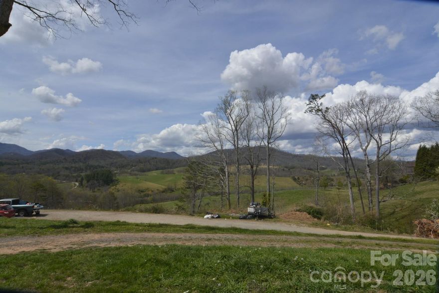 Enjoy the spectacular views from this approximately 3.5 acre property with a Manufactured Home that needs to be completed.  3 bedroom septic has been installed for the home and it connected to the shared well of the neighboring property.  Additionally there is a large pad that has been graded out on the lower section of the property that would make location for future development.  Do not disturb tenants in home.