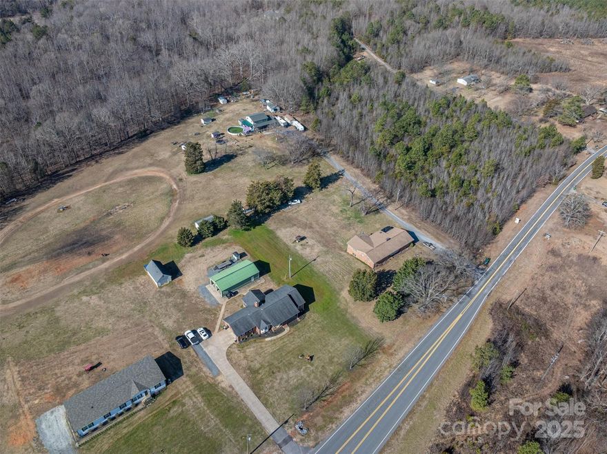 Attention Investors: Un-Zoned!  Approximately 1000 Feet off of I-85 South at exit 104 at Loves Travel Center exit. Consisting of 3 parcels together equaling 4.52 acres, 161 Ft road frontage on Tribal Rd. Located about 750 Ft from Shelton Fireworks. Also at this exit is the Loves Travel Center, McDonalds, and others. Approximately 6 miles south of TWO KINGS CASINO. County Water with Board of Public works Gaffney, Broad River Electric. Plans for sewer 2025 with Cherokee County. There are two homes located on the property that could be used as rentals for now if new owner would choose to do so. Additional adjoining 3.99 acres at 585 & 591 TribaL Rd. available for $1,000000.00 together all for $1,800,000.00 giving you then a total of 8.51 Acres See MLS4231586