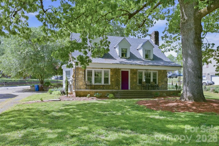 Two for one! Old soul. New upgrades. Endless potential. This 3-bed, 1.5-bath stone cottage is the rare find that checks every box — original character, granite kitchen, renovated baths, hardwood floors, and a sun-soaked yard with mature shade trees.
The bonus? A separate 2-bed, 1-bath garage apartment ready to generate rental income from day one. Plus a vacant buildable lot with its own PIN — live in it, build on it, or sell it. However you play it, you win.
