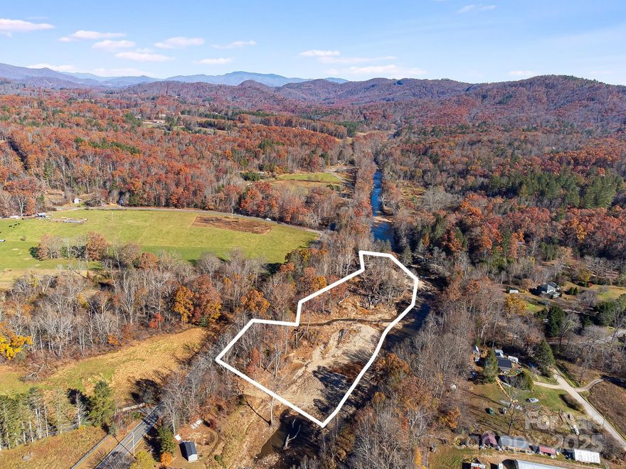 3.88 Acres of Riverfront Beauty in the Heart of Celo 
OVER 900FT OF RIVER FRONTAGE ON SOUTH TOE RIVER
Discover your own slice of mountain paradise with this 3.88-acre riverfront property off Hwy 80 S, nestled in the desirable Celo community of Yancey County. Perfect for outdoor enthusiasts, hobbyists, or anyone craving a peaceful escape, this property offers direct river access—ideal for fishing, kayaking, or simply relaxing by the water’s edge.

Whether you envision a private camping retreat, a tiny-home getaway, or a base for your mountain adventures, this unrestricted tract gives you the flexibility to bring your vision to life. Enjoy easy access from Hwy 80 S while still feeling tucked away in nature’s serenity.

An appraisal completed in 2025 provides added confidence and insight into this exceptional land’s value. Opportunities like this—riverfront land in Celo—don’t come along often!
