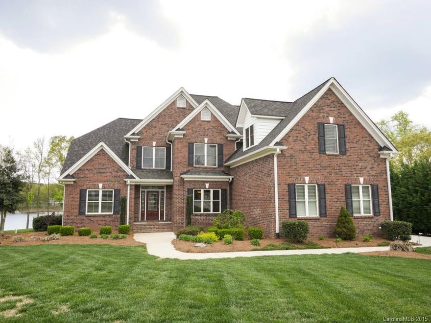 Rare panoramic lake views on 1.2 acre level waterfront lot in a cul-de-sac with a custom built all brick home equals the retreat you won't want to miss owning! Chef's dream kitchen, peaceful master get-a-way with spa-like master bath and attached sunroom that affords breathtaking lake scenes. Feel like you are on vacation everyday and experience this one today!