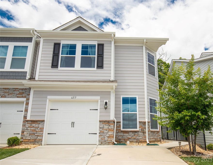 Welcome Home to Lake Wylie! We love this amenity rich townhouse community at Ivy Ridge. Tucked in the heart of Lake Wylie and in the award winning school district sits this adorable 3 bedroom/2.5 bath END UNIT townhome with a 1 car garage. This unit has barely been lived in and feels fresh and new! We love the ample natural light that pours into the open concept living/kitchen/dining main level that features a gas range, grey cabinets and granite counters. The backyard of this unit is very private and ready for some cafe lights and seating to entertain! Upstairs, you will find a bonus area for a cozy tv room, gym or additional working space. The over-sized primary bedroom and bathroom have huge windows with lots of natural light. Two more bedrooms, full bath and laundry room are located upstairs. This community features full landscaping and irrigation included along with a community pool, clubhouse, gym and playground with affordable monthly fees and lower property taxes.