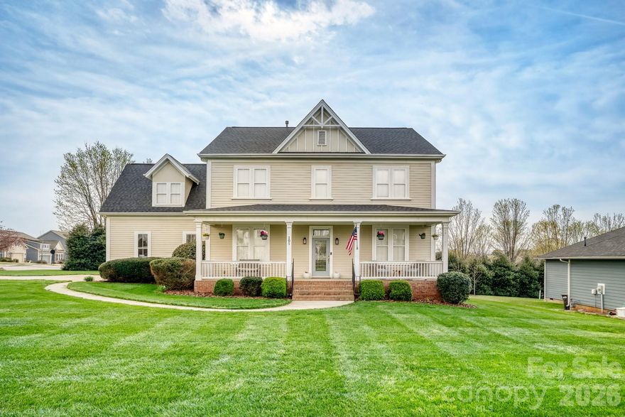 Beautiful Craftsman-style home in the serene golf community of Larkin, set on a large, level corner lot with a side-entry garage and expansive yard. A charming Southern-style covered front porch invites relaxed rocking-chair afternoons and adds timeless curb appeal. Inside, a dramatic two-story foyer is flanked by a formal dining room and flex space. The light-filled great room flows seamlessly into a spacious kitchen with island, abundant cabinetry, and a bright eat-in area—perfect for everyday living and entertaining. Upstairs features three secondary bedrooms, a full bath, a 320-sq-ft bonus room, and a private primary suite with walk-in closet and en-suite bath. Detailed mouldings and trim throughout highlight quality craftsmanship. Convenient to I-77 with easy access to Mooresville, Charlotte, and Winston-Salem—this home offers peaceful living with commuter convenience. A must see!