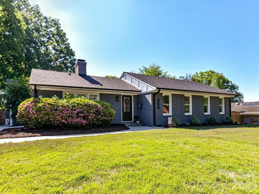 Nestled in one of Charlotte’s most sought-after neighborhoods bordering Colonial Village and Lower South End, this beautifully renovated 3-bedroom, 3-full bathroom brick ranch blends timeless charm with urban convenience. Situated on a quiet, tree-lined street yet minutes from South End, Dilworth, Uptown, Montford, and Freedom Park, this home offers unbeatable access to some of the city’s best dining, shopping, and entertainment. Plus, it’s walkable to the Scaleybark light rail station, making your commute or city adventures a breeze.

Step inside to an open floor plan with beautifully refinished original hardwood floors that flow seamlessly into the great room's brand-new matching hardwoods. Fresh neutral paint and abundant natural light create a warm, airy ambiance throughout. The kitchen boasts white cabinetry, granite countertops, stainless steel appliances (including a brand-new refrigerator), and sleek new tile flooring. The flexible floor plan offers a formal dining room and two living areas, making this home perfect for entertaining or simply spreading out. Two wood-burning fireplaces featuring exposed brick add a touch of character and charm. The primary suite is a true sanctuary, featuring a renovated spa-like bathroom with marble floors, steam shower, standing tub, double vanity, and a walk-in closet. Two additional generously sized bedrooms share an updated full bath. Outside is a private backyard oasis, complete with an expansive composite deck, paved patio, and a fenced-in yard with plenty of space to play or relax. A standalone shed provides extra storage, and recent updates like a new roof (2024) and HVAC ductwork (2021) offer peace of mind.

Set in a vibrant area with exciting new development, including upcoming retail and dining options, this home is a rare find that perfectly balances classic charm with modern upgrades—all in a prime location. Don’t miss the opportunity to make this exceptional property yours!