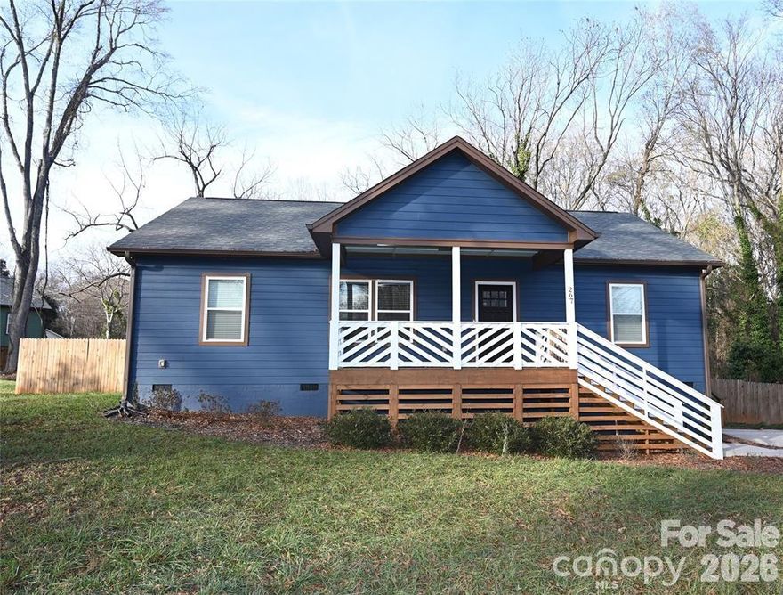 One story living and built in 2024!  Close to the quaint and charming town of York, SC! This home features hardwood foors, gourmet kitchen that includes eye-cathing white cabinets, beautiful quartz countertops, island and a spacious eat-in breakfast area. Stainless steel appliances including refrigerator, waher/dryer will remain with the home. Kitchen is open to the generous sized family room. Split bedroom plan allows for privacy from primary bedroom to the two other bedrooms and guest bath.  Primary en-suite enjoys a custom walk-in closet and dual vanities. You'll love the covered front porch and the expansive deck on the back of the home!  Fenced yard for privacy and conveniently located near restaurants, shops and Historic York!