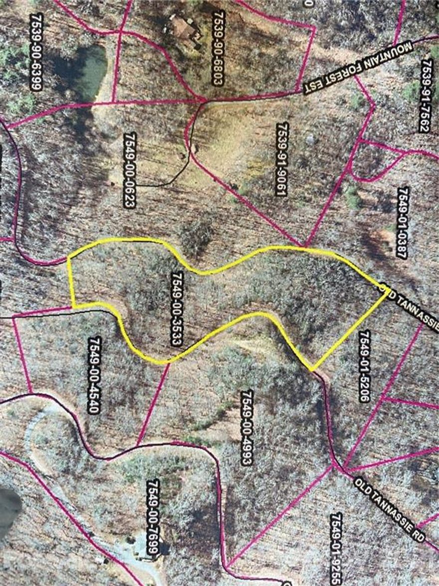 A RESTRICTED DEVELOPMENT ONLY 2.5+/- MILES FROM WCU A GREAT LOCATION. LITTLE SAVANNAH AREA, GOOD ROADS, WOODED VIEWS & MUCH MORE. LOT 49 Jackson County Schools Survey and tax card do not match