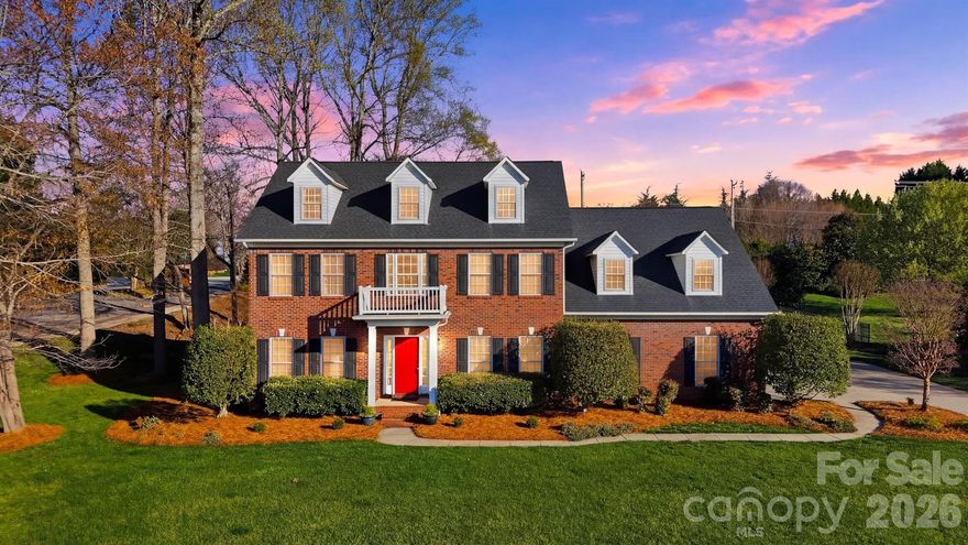 Nestled in the desirable Olde Savannah subdivision, this stunning all-brick Colonial home offers timeless elegance and thoughtful design throughout. Ideally located just minutes from I-40 and NC-16, commuting is effortless while shopping, dining, and everyday conveniences in Hickory are just a short drive away.
Step inside the impressive foyer featuring arched doorways flanking the staircase, setting the tone for the refined details found throughout the home. The main level showcases beautiful hardwood floors, crown molding, and abundant natural light. A bright, light-filled formal dining room and an elegant living room with a coffered ceiling provide wonderful spaces for gatherings and entertaining.
The spacious great room centers around a cozy gas-log fireplace, while a comfortable sunroom with double doors opens to a charming, bricked patio, seamlessly blending indoor and outdoor living. The well-appointed kitchen and breakfast area overlook the backyard and provide easy access to the patio—perfect for morning coffee or evening meals outdoors. A convenient laundry room just off the garage entry adds everyday practicality.
Upstairs, the primary retreat offers a peaceful escape with an ensuite bath featuring dual vanities, a separate tub and shower, and generous walk-in closets. Three additional secondary bedrooms and a shared bath provide ample space for family or guests. Hardwood flooring continues on the upper landing, adding warmth and continuity.
Outside, the beautiful, fenced-in backyard creates the perfect setting for entertaining, relaxing, or enjoying quiet evenings on the patio. Extensive landscape/home exterior lighting and entire home equipped with gutter guard system.
Combining classic Colonial charm, spacious living areas, and an ideal location just moments from Rock Barn Golf Course, this home offers comfort, style, and convenience in one exceptional property.