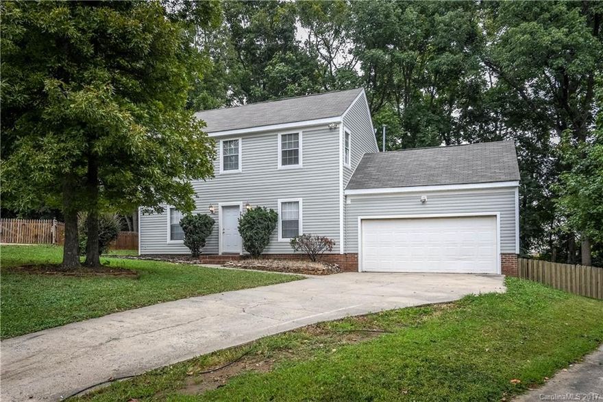 Fantastic Cul-de-sac home on over 1/2 acre in desirable Wexford.  Prime location between UNCC and Harrisburg.  Minutes to University area, hospital, shopping, etc.  Easy access to 485 means quick trips to North or South Charlotte.  New decking overlooking huge fenced backyard.  Large Family Room w/wood burning fireplace.  2nd Floor Master Suite. 2-car garage. This home is move-in ready with fresh paint and new flooring.  Ideal for starting out or stepping up.  Excellent investment opportunity!