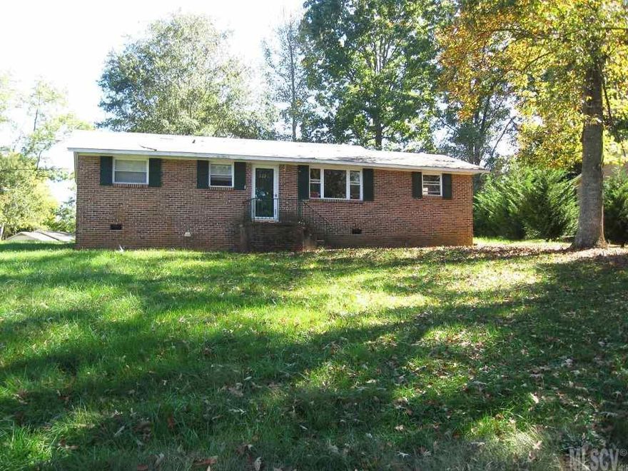 Great starter home or investment property. Full Brick home, paved drive. Almost 1000 sq feet. Carport, corner lot in Hildebran. Way under tax value, this one won't last long!