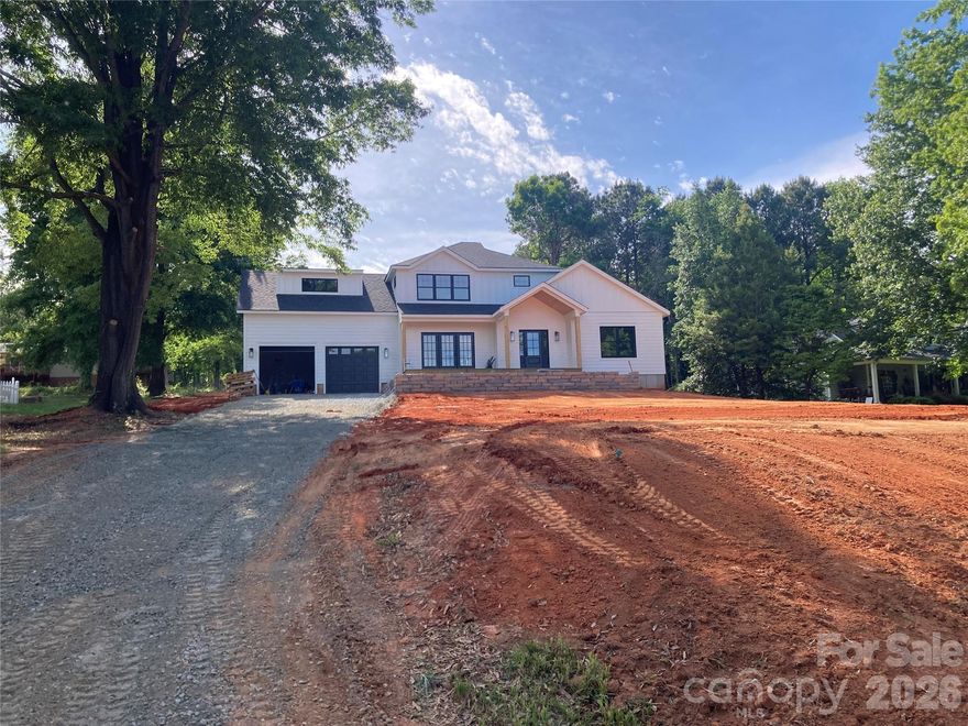 Discover modern living in this brand new construction home in Sherrills Ford with beautiful views. This 3 bedroom, 2.5 bathroom design features an open concept kitchen, living, and dining area built for effortless everyday living. The main floor includes a spacious primary suite with a walk in closet and well appointed bath. Upstairs offers two additional bedrooms and a versatile bonus room ideal for a media space or playroom. A 2 car garage provides convenient parking and storage.

Community lake access is just a short distance away and offers space for picnicking, fishing, swimming, and launching kayaks or canoes.

Enjoy the comfort of new construction, thoughtful design, and a scenic setting close to Lake Norman conveniences.