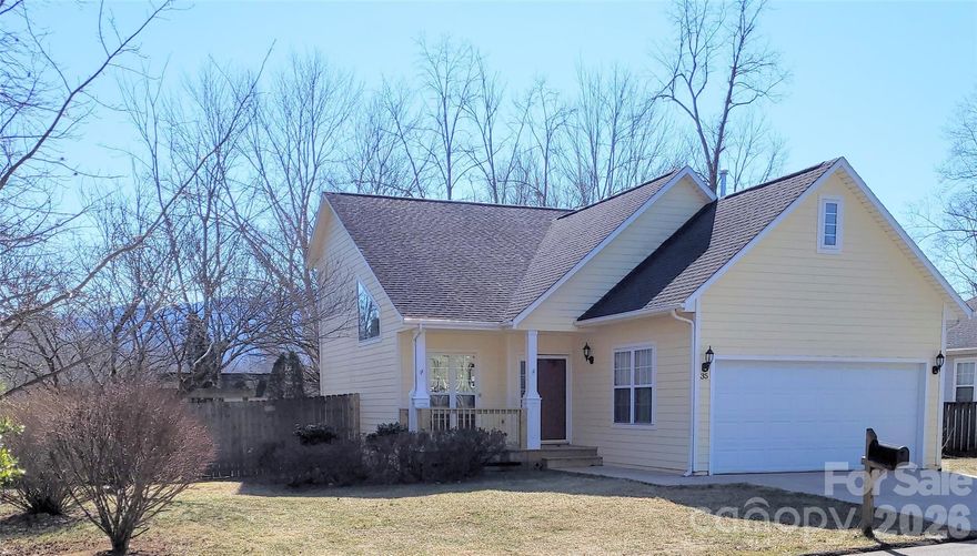 This lovely 3-bedroom, 2 bathroom home is in the treasured Black Mountain neighborhood of Cotton Creek with a creek greenway just steps away, & downtown Black Mountain is only 1 mile away. Enjoy mountain views from all around the house and the benefits of a corner lot. 
On the main floor: an open living room flows into the dining and kitchen area w/wood floors & fire place,
primary bedroom w/ en-suite & walk in closet, laundry room, indoor access to the two car garage, and an additional south facing sunroom for office or dining with access to the ample and private fenced back yard.
Upstairs: 2 bedrooms with lots of light & a conveniently located full bath in between both bedrooms
 This home has been respectfully cared for and is in a great location; if you chose to, you can enjoy your home and neighborhood, be downtown to eat out or shop in two minutes, walk by the creek, and see mountain views everyday!