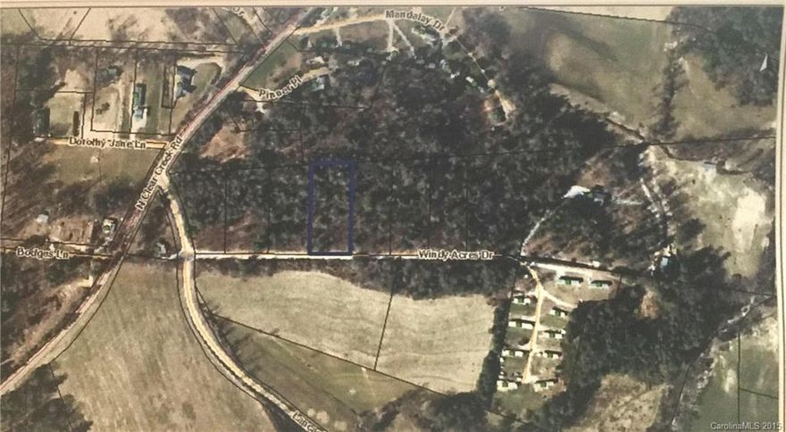 Beautiful, flat lot w/ great road frontage, lg hardwoods, great privacy. Septic & well permits being issued. Suitable for doublewide, on/off frame mod. All lots have exclusive right to construct by Oakwood Homes of Fletcher (developer) and any homes placed on lots must be purchased from them. Excellent location with easy access to restaurants, shopping, entertainment. Must see!