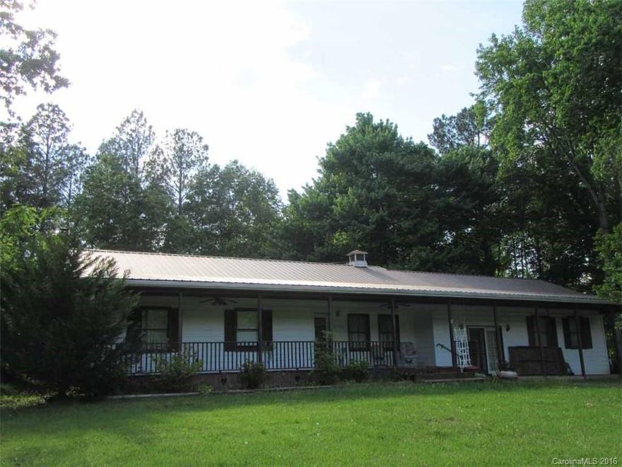 Country Living!  Enjoy peaceful living in this 3 Bedroom, 1.5 Bath ranch.  Features Living Room, eat-in kitchen, sunroom, den, office, finished basement, detached storage building on 3.08 acres with detached garage/workshop.