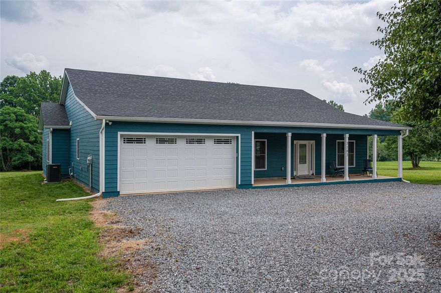 Discover this lovely crafted 3-bed/2-bath custom-built home by the current owner. Located in a prime neighborhood close to Lincolnton & Cherryville, this home offers privacy, convenience & quality. Enjoy an open layout that connects a spacious living, dining & kitchen area. The kitchen is a chef’s dream. Custom cabinetry, deep soft-close drawers, granite countertops & large island are ideal for casual dining or entertaining. The split-bedroom floorplan offers privacy, w/a primary suite featuring a walk-in closet & a spa-like bath with double vanities, soaking tub &  separate shower. Other highlights include a large laundry room, oversized double garage w/bonus storage/office space as well as energy-efficient sprayed insulation throughout & PEX plumbing with central shutoffs. The covered front & back porches offer year-round enjoyment. The detached garage is perfect for a workshop, studio or extra storage…every homebuyer’s dream. This one-of-a-kind forever home checks all the boxes.