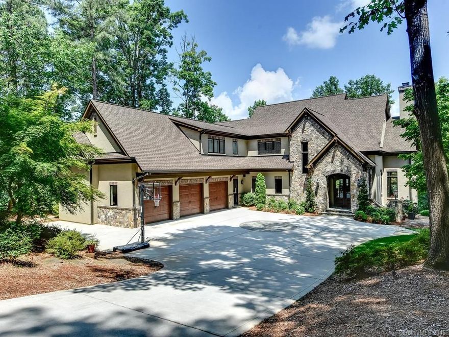 Luxury Waterfront lifestyle awaits in this Custom built home of the finest distinctive details! Private dock just 200 yards from the main channel. Chef's kitchen w/warming drawer, wine cooler, gas cooktop, dbl ovens & awesome Lake Norman views. Gorgeous coffered GR ceiling. Main lvl Master w/HWs & heated BA flr. 4 FP's, Media rm w/all equip. LL 2nd liv qtrs & 2nd Kit. Scrn porch/Outdoor Kitch. Low maint Trex Dock. Blt-in humidifiers, whole house generator, mechanl rm w/WI vault. Can have a pool.