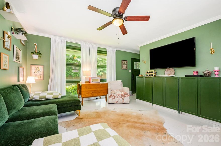 This 2 bed, 1 bath one-story home is bursting with personality in the desirable Cotswold area, seconds from two grocery stores and Cotswold Shopping Center. The colorful palette and whimsical decor in this end unit make this cottage the perfect mix of charm and everyday convenience with plenty of community green space to frolic around. Featuring a double oven for those who love to bake, this home has been meticulously cared for by its owners. Upgrades include removal of popcorn ceilings, new HVAC in 2022, new dishwasher in 2023, addition of crown molding, new refrigerator, and installed recess lighting in hall and bathroom, and more! Extra storage room right across from back door but not attached to home. HOA includes water/sewer. Come feel the cozy magic of this space and call this condo your own!