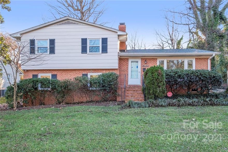 This Charlotte two-story home offers granite countertops.