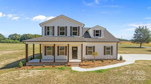 Photo of 2441 Wolf Pond Road, Monroe, NC 28110 (MLS # 4311378)
