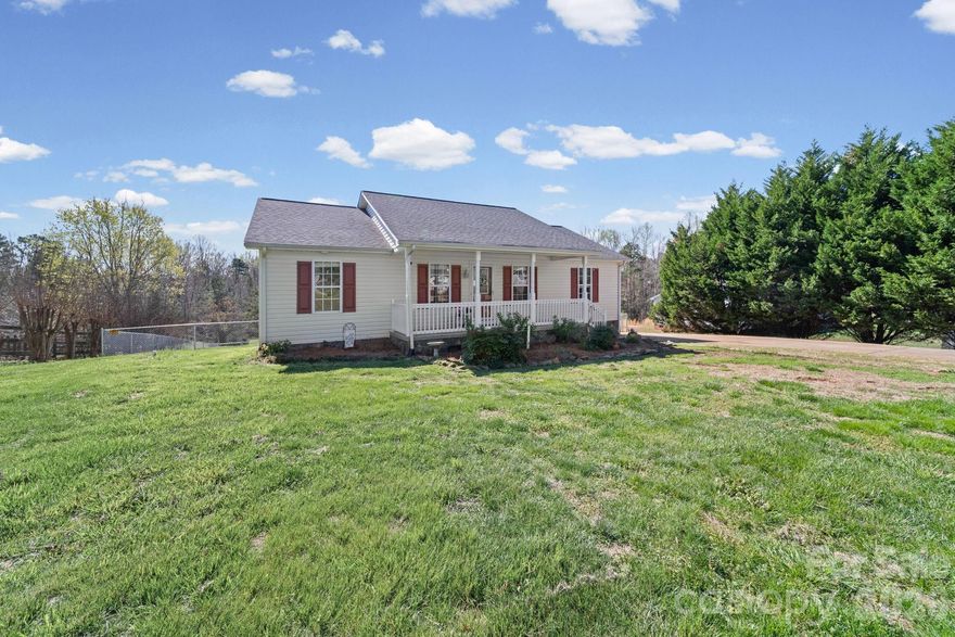 Inviting one-story ranch in Stanley set on a spacious, oversized lot! This 3-bedroom, 2-bath home features a desirable split-bedroom floor plan, fresh paint throughout. Enjoy an open-concept kitchen and living area perfect for everyday living and entertaining. Step outside to enjoy the brand-new deck overlooking a peaceful, expansive, fully fenced backyard. Conveniently located just minutes from town, shopping, dining, and schools--this property offers the perfect blend of comfort, space, and location.