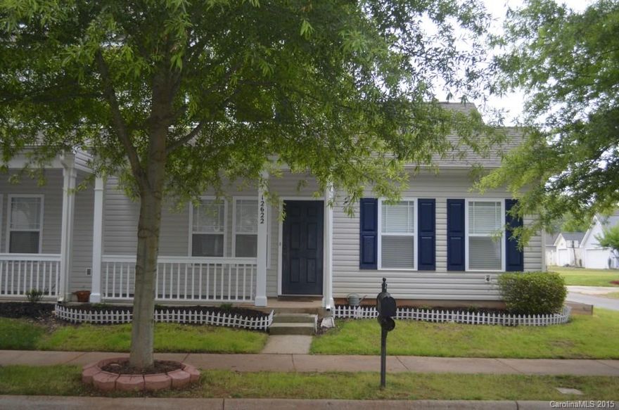 Wonderful 2 BR TH w/hardwood floors and Master on main level. 2nd level features a loft and a bedroom w/private full bath. Dramatic 2 story living room w/ceiling fan. Rocking chair front porch. Private parking pad for 2 vehicles. LOW HOA DUES!