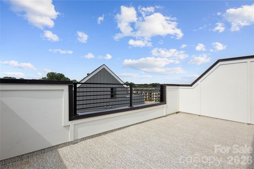 Just steps away from everything that Lower Southend has to offer. Chambray at LoSo is a prime location with everything close by. This 4 bedroom, 4.5 bath, 4-story end-unit townhome features a rooftop terrace and a rear load 2-car garage. The spacious Roseview floorplan offers abundant natural light throughout. The home is beautifully finished with the Modern Art Deco Design Collection, showcasing rich wood tones and numerous upgraded features. Each bedroom includes its own en-suite bath, ideal for guests or multigenerational living. Don't miss this opportunity—schedule your tour today!