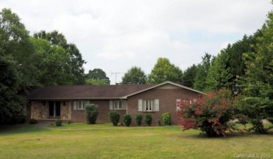 2.97 +/- Acres of Land & lots of space in this brick ranch with basement & in-ground pool. Property was remodeled in 2008 & is handicap accessible. Lots of hardwood floors on main level; 2 fireplaces each with rock surround; kitchen with breakfast bar & eat-in area. Large remodeled bath w/wheel chair accessible shower & large tub. Huge deck overlooking the pool area. Older barn on rear of property. Excellent opportunity to make this property your home!