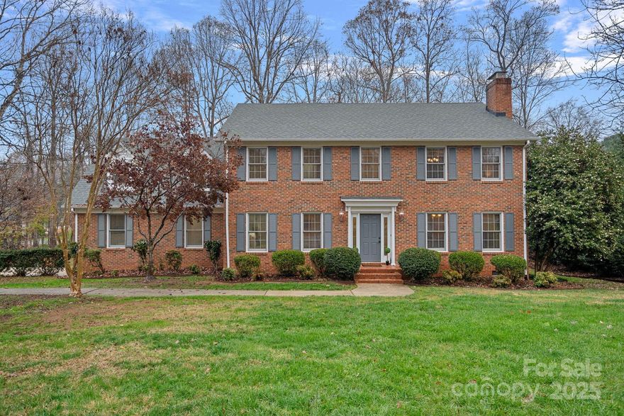 Nestled on a quiet cul-de-sac street, this beautifully updated full brick 4 bedroom, 3 bathroom home offers space, style and privacy on nearly a half acre. With its peaceful setting and low-traffic location, this property is a true retreat while still being close to everyday conveniences. Step inside to discover an interior that feels brand new, featuring fresh, neutral paint throughout and a thoughtfully designed floor plan with over 3200 heated sq. ft. The updated kitchen shines as the heart of the home, boasting granite countertops, stainless steel appliances and a tile backsplash, blending modern elegance with timeless durability. The main level includes a flexible bedroom that could serve as a home office or a second primary suite, offering incredible versatility for guests, multi-generational living, or work- from- home needs. The spacious living room is warm and welcoming, anchored by a gas fireplace with a brick surround, adding charm and a timeless focal point.  All bathrooms have been thoughtfully updated, offering modern comfort and design. Upstairs, you'll appreciate the new carpet, adding beauty and comfort throughout the second level. The expansive primary bedroom suite is truly oversized, providing a private oasis with ample space for relaxation. The suite continues to impress with a walk-in closet featuring custom built-ins. A standout feature of the home is the private bonus room, complete with a separate staircase, making it the perfect space for a media room, playroom, home gym or creative studio. Step outside to the oversized Trex deck, where you can relax and enjoy serene views of the newly tree-lined backyard, offering natural beauty and privacy with plenty of room for outdoor activities. The expansive lot offers endless potential for gardening or custom outdoor living enhancements. A rare opportunity combining updates, generous living space, and an exceptional lot in a prime setting. This home truly has it all. Living here you are just 10 minutes from everything that downtown Rock Hill has to offer!