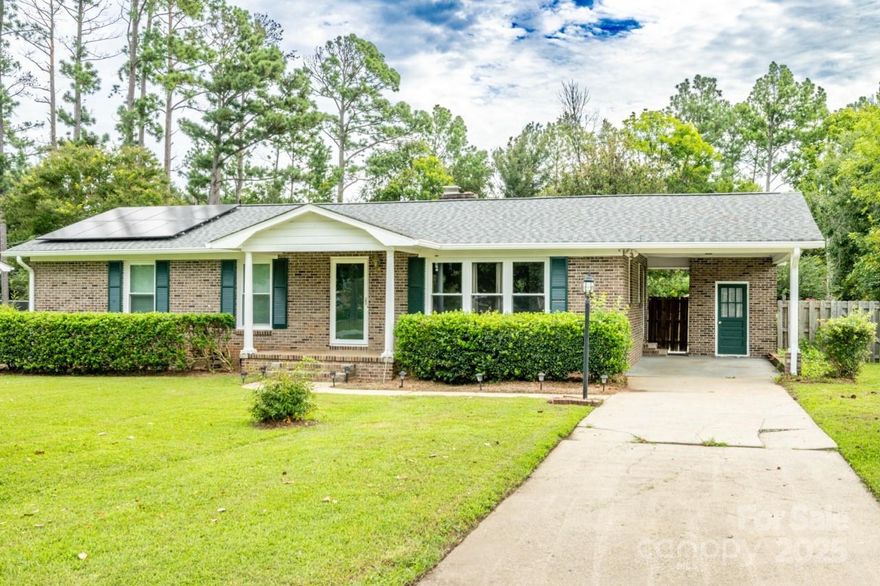 This beautifully maintained 3-bedroom, 2-bath brick ranch seamlessly blends timeless charm with modern updates. Inside, a spacious living room with a cozy fireplace creates the perfect setting for relaxing evenings or entertaining guests. The kitchen is thoughtfully designed with granite countertops, a central island, and abundant cabinetry to meet all your storage and prep needs.

Recent upgrades provide both comfort and peace of mind, including a new roof and gutters (2024), tankless water heater, energy-efficient windows, and new doors. A fully equipped solar panel system enhances sustainability while significantly reducing energy costs.

Outdoors, enjoy a private, fenced backyard complete with a storage shed—ideal for outdoor living, hobbies, or additional storage. With major improvements already completed and a focus on energy efficiency, this move-in-ready home offers exceptional value.