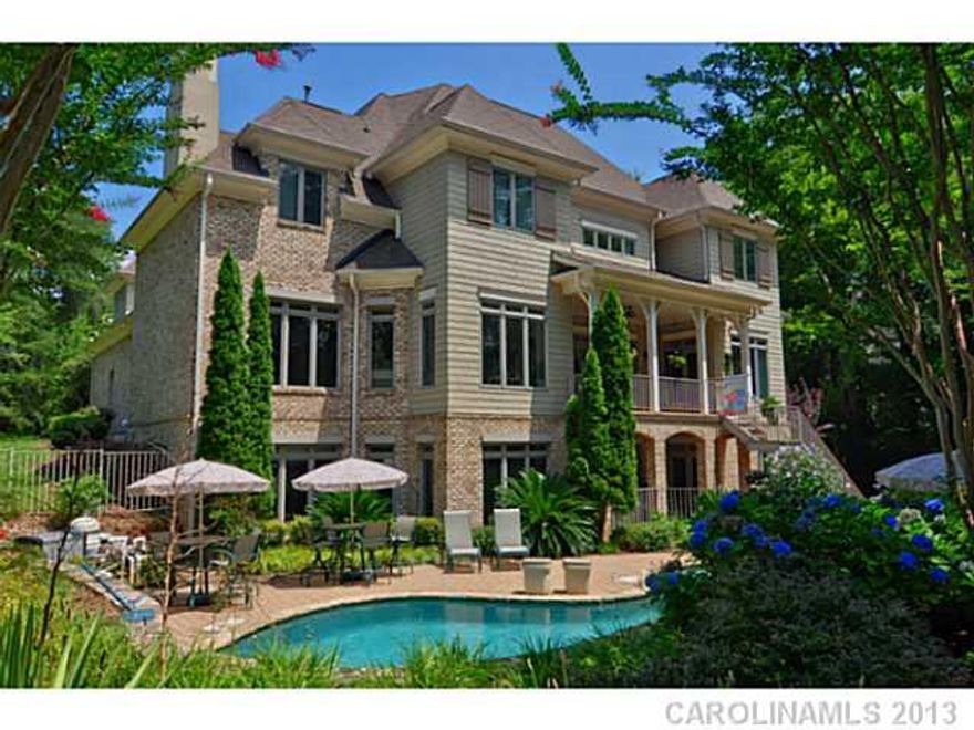 Beautiful Simmonini built home with gorgeous pool area with waterfall overlooking Lake Norman. 3 plus acre lot is wooded and private. Situated just inside of a cove that opens to the main channel. Enjoy plenty of nearby restaurants by land or water. Shopping, banks, medical, groceries all within 5-10 minutes and still just 15-20 miles from Charlotte. Virtual Tour http://tour.circlepix.com/home2/SS