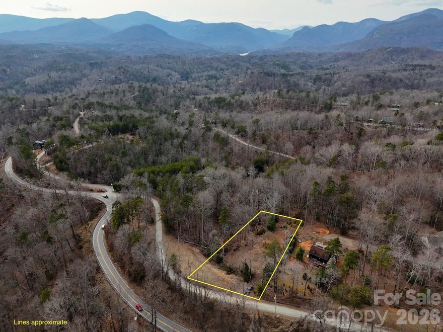 Build Your Mountain Home with Utilities Already in Place! opportunity to own a 0.54-acre lot in the gated community of Riverbend at Lake Lure. This property offers a head start and significant cost savings for your build, as a well and septic system are already installed (previous home was lost to fire). Sitting in a private setting with mature trees, this lot features seasonal mountain views and a gentle topography perfect for a mountain home.

Enjoy Riverbend’s amenities: two private lakes (Mirror Lake) with a sandy beach, Broad River access for tubing and kayaking, hiking trails with waterfalls, and a community pavilion. Short-term rentals are allowed, making this an ideal location for an investment property or a secondary getaway. Minimum 1,000 sq. ft. build required. Don't miss this "ready-to-go" canvas in Lake Lure’s.