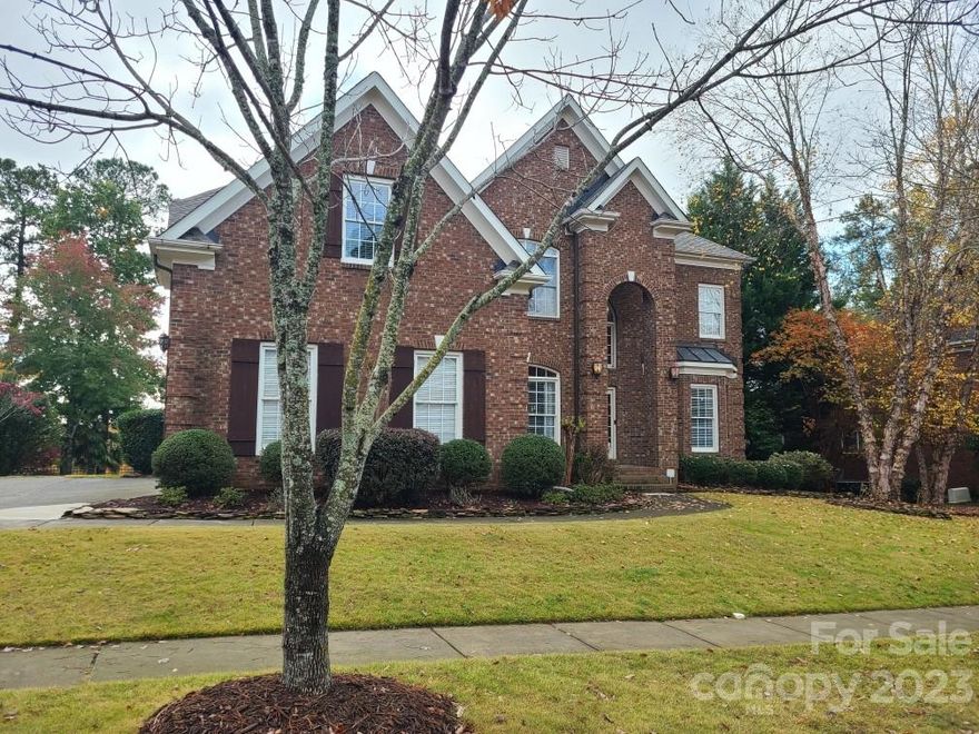 What a beauty on the 11th hole on the golf course in Tega Cay!  Primary bedroom on the main level with 4 other bedrooms upstairs and home has 3.5 baths..Chef's kitchen with breakfast area.  Full brick home with 3 car garage and an UNBELIEVABLE POOL in back for entertaining! Situated on a cul-de-sac.  SO MANY EXTRAS which include New roof, freshly painted cabinets in kitchen, new dishwasher and cooktop, gutter guards, irrigation system, a beautiful room that is wired for theater with flush mount speakers in the wall and nearly all windows have custom draperies -NO HOA!!  Many amenities for you to enjoy like golf and tennis and of course Lake Wylie..Desirable school district! You must see it to believe it!