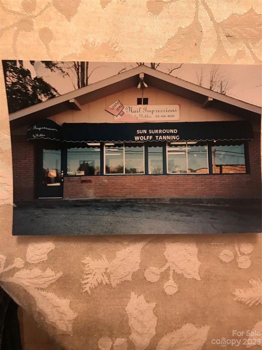 Two charming, exquisite buildings, nestled one block off Main Street in the vibrant town of Waynesville, each offering a unique opportunity for business endeavors. These properties are well maintained, boasting a prime location and versatile spaces suitable for various ventures. One building is currently utilized as a tattoo parlor. The building caters to the needs of diverse businesses. 
The second building, was housing a flourishing hair and nail salon. Could be utilized as a unique opportunity for those in the beauty and wellness industry. The well-designed salon space provides a serene ambiance, perfect
 for pampering clients. 
this property stands as a testament to the potential for creativity and innovation in the heart of the community.
Both buildings benefit from their central location, ensuring a steady flow of traffic. Explore these properties firsthand and envision the exciting possibilities they hold for your business aspirations.