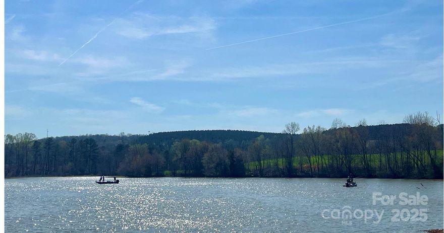 This Amazing 9.66 Ac. "Land Mark" Property steeped in rich history on Lake Tillery NC, Norwood, NC, Stanly County, NC is now for sale.  This pristine farmland has a gentle rise from the shoreline to beautiful hilltops views. A DREAM COME TRUE for buyers wanting a small estate tract on Lake Tillery.  This property is located at the corner of Indian Mound Road, and Bowers Road in Norwood, NC.  There is a bridge, we call the "steel bridge" that allows access to this property with fishing boats, and other low profile watercraft.  This is the perfect location to launch a canoe from the shoreline and enjoy the area that Duke Energy has noted as a protective area for wildlife. Map posted in the photos.  This tract has the best of both worlds with approximately 724 feet of shoreline designated for 800 Sf dock/boathouse, if approved by Duke Energy.  In an effort to preserve, and keep this property PEACEFUL and attractive there will be restrictions that most buyers will appreciate.  A MUST SEE!