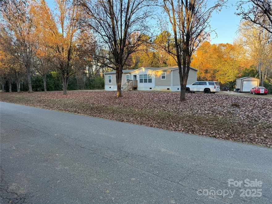 Space, Style & Location – All in One! This beautiful 3-bedroom, 2-bath home sits on an expansive 2.44 acres and offers the perfect blend of privacy and convenience! Enjoy the open floor plan with a desirable split-bedroom layout, ideal for comfortable living. Stylish vinyl plank flooring flows throughout, while double sinks in both bathrooms add everyday luxury. Located with easy access to shopping, dining, and entertainment, this home truly has it all. Don’t miss your chance schedule your showing today! 
Located right off of Highway 5 and 521 going into Lancaster.