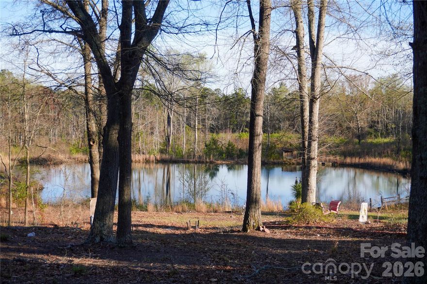 Land Sale!  Remarkable acreage (25.64, 2 parcels combined) located in town of Kershaw SC.  Land gently rolls downhill and has pond access.  Although located within town limits, with a little creativity, would be great site to build a home and have seclusion.  Land has been family owned for decades!  Nice property with good location.
