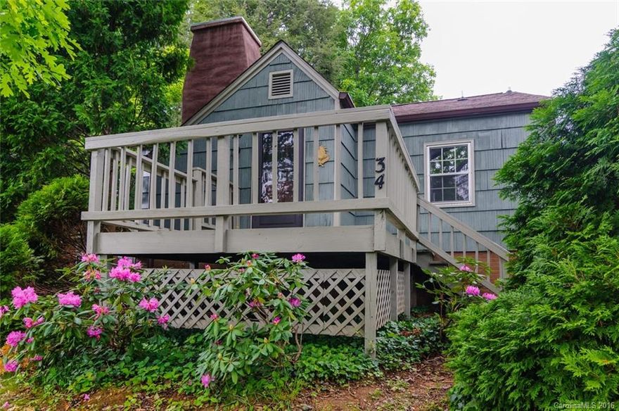 Charming cottage located in Beverly Hills just minutes to downtown Asheville and walking distance to the 18 hole golf course designed by Hall of Fame golf architect Donald Ross. Great walking neighborhood.  Property features include hardwood floors, recently remodeled bathroom, plenty of storage in attic and crawl space, great yard for pets or gardening, mature landscaping and front porch.
