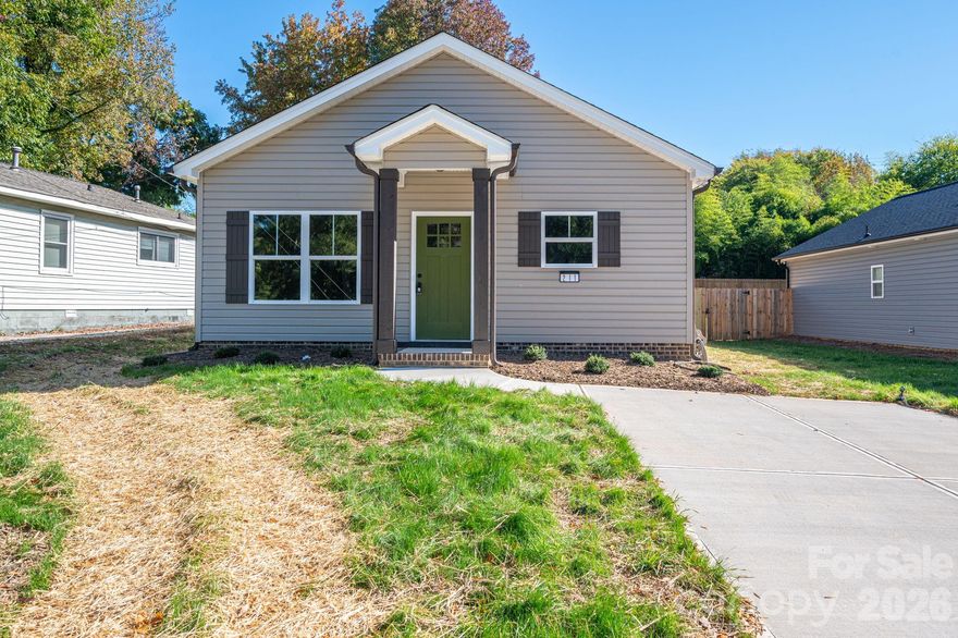 Welcome to your dream home!  This adorable new construction 3-bedroom, 2-bath home combines modern elegance with thoughtful design to create the perfect living space.  From the moment you step inside, you'll be greeted by an open concept layout filled with stylish finishes throughout.  Elegant wide-plank LVP flooring extends throughout the home, complemented by premium stainless steel appliances-including a refrigerator.  Bathrooms feature designer tile surrounds in the tub/shower areas, while sophisticated modern millwork adds a refined finishing touch throughout.  The primary suite includes a charming en-suite bath, perfect for unwinding in comfort and tranquility.  Two additional bedrooms provide flexibility for guests, a home office, or a growing family.  Perfectly positioned with quick interstate access and close proximity to Charlotte.  Some of the photos are from another property built by the builder and are only representations of what the property will look like when finished.