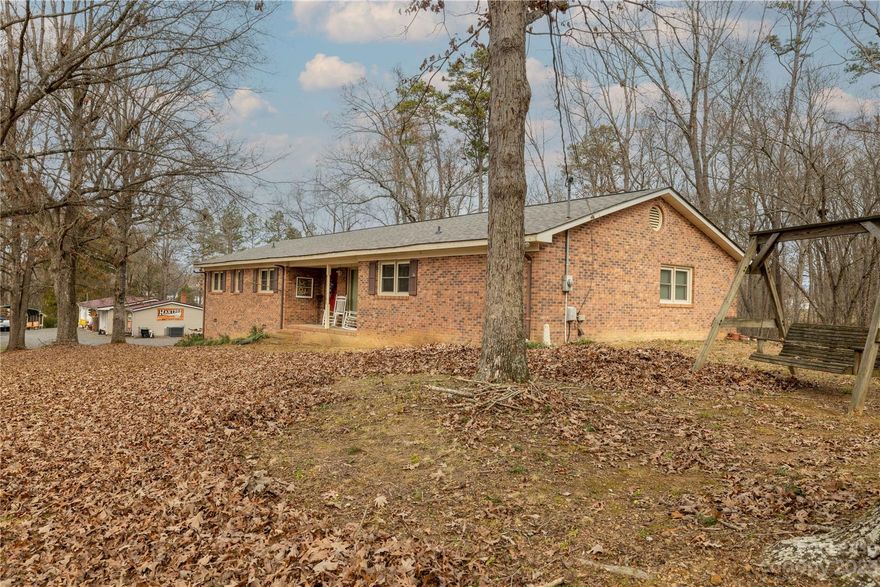Welcome Home, to this well maintained spacious brick home. This home features 3BR, 2BA home located in a quiet neighborhood on a dead end street.  Nice open floor plan with bamboo floors,  generous size bedrooms, sits on almost an acre with plenty of room to roam, covered front porch, attached garage with circular driveway in back with plenty of parking.
