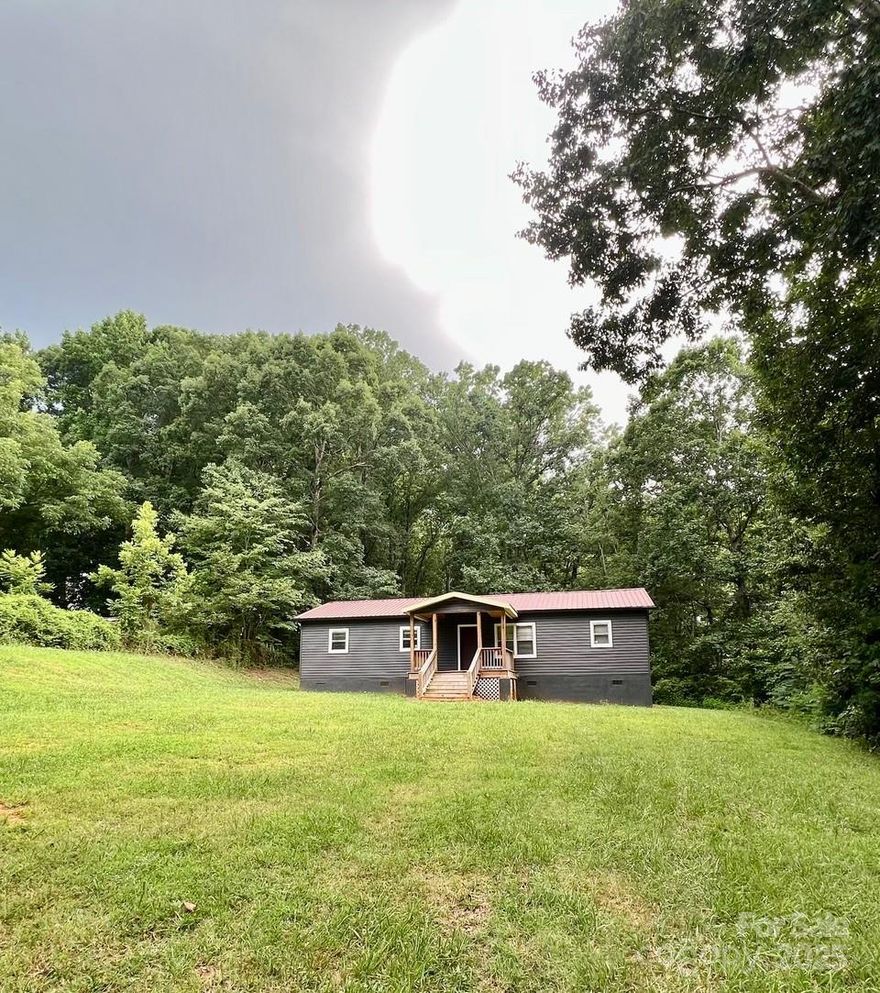 Great Opportunity for an investor or someone who wants to create sweat equity! This attractive stick-built home on .71 acres is in need of finishing. It has four bedrooms and two full baths with an open split floor plan and a large lot close to Hwy 150 Village at Sherrills Ford shopping, dining and Lake Norman public access. The owner has moved this home and started the process of getting it finished and securing a Certificate of Occupancy. The foundation was approved and a septic permit for three bedrooms was issued but has expired. (One of the four bedrooms could be used as something else if closet is removed.) The new owner could apply for a four-bedroom septic as an alternative. There is public water at the road and the tap fee has been paid according to the county but the home has not been connected. An electrician and plumber needed to connect utilities and hot water heater. HVAC system needed as well as septic. The property is being sold "as is, where is".