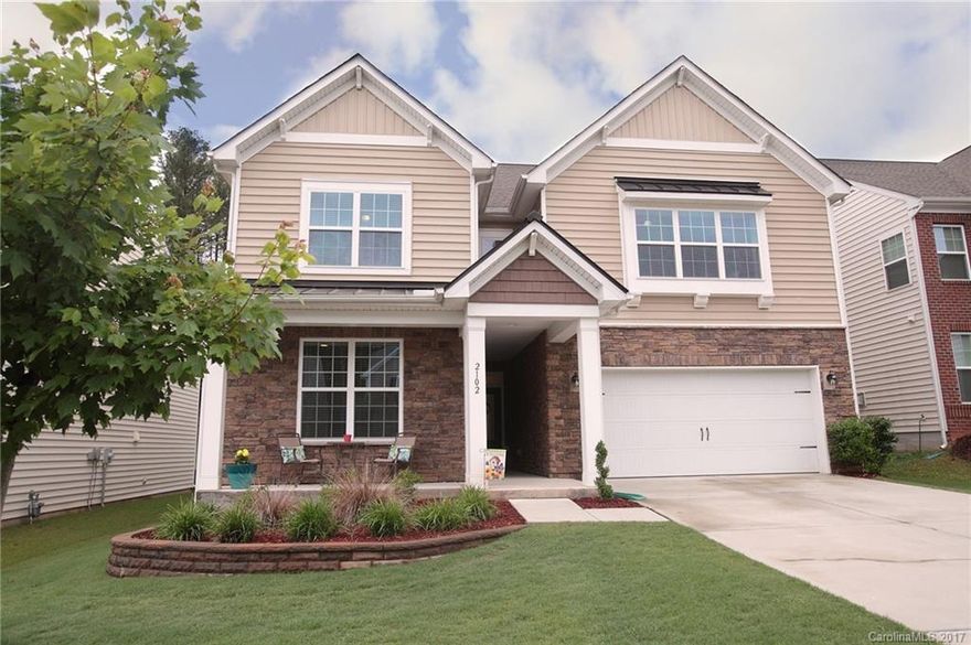 RARE! RARE! In-law quarters on main level with private entrance. Only three built in Carolina Reserve. Like-new construction, this open floor plan home boasts a gorgeous private view including an outdoor entertaining space that will leave your guests swooning. Amazing natural light (compliments of skylights) flood 2nd floor living. Hardwoods throughout main level, ample storage and community amenities galore (pool, playground, dog park, fitness center, clubhouse & walking trails).