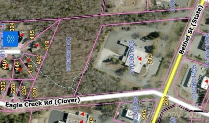 4.358 Acres behind the US Post Office Clover SC-Zoned B-2 (Commercial) in Town of Clover-Two Access points 73.10' on Bethel Street & 306' on Eagle Creek Drive-Bethel Street access is shared with USPS & Bojangles-no utilities currently on site, but access to Town of Clover water & sewer is possible subject to tap fees & cost of running lines to site location. Susan Caldwell, listing agent, is one of the shareholders of Land Grant Investments.