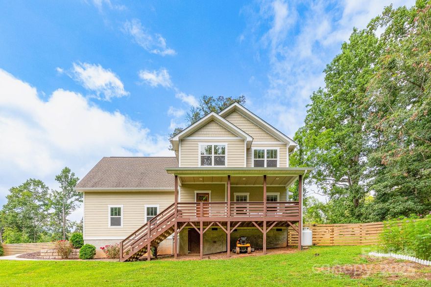 Welcome home to the one that checks all the boxes! Beautifully built and well-maintained, this 3 bedroom, 2.5 bath home offers comfortable living and plenty of space for indoor and outdoor entertaining. The main level's open floor plan boasts a dream kitchen with abundant cabinetry and stunning quartz countertops, a large dining area, and a great room...where you can relax by the cozy fireplace. On the upper level you’ll find a spacious bonus room that's perfect for movie night, game days...or it could even be used as a home office. Also located on the upper level, are the primary bedroom with ensuite and walk in closet, 2 additional bedrooms, full bath, laundry room, and hall closets. Outside, the large, fenced backyard provides the perfect setting for relaxing by a fire pit, hosting weekend cookouts, or enjoying a bit of gardening. Conveniently located between Asheville and Hendersonville, this home has it all...the space, features, and charm you’ve been looking for!