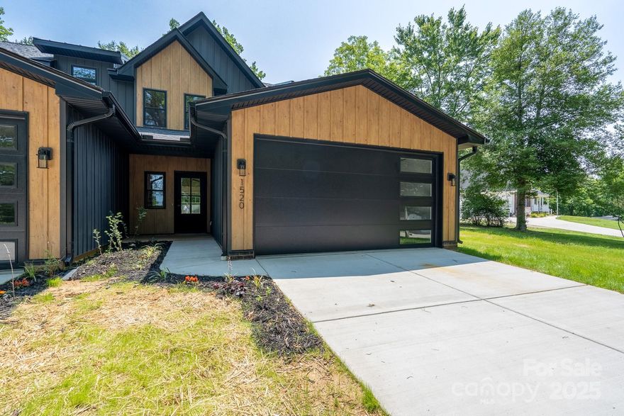 This beautifully designed 4-bedroom, 3-bathroom home combines modern touches with functional living. Step inside to discover custom kitchen cabinetry,and stylish modern  lighting, with durable luxury vinyl plank flooring throughout. The entryway features a convenient coat closet for guests. The spacious, open-concept living area boasts 9-foot ceilings and an abundance of natural light, creating a welcoming atmosphere. The kitchen is complete with a large island,and sleek stainless-steel appliances and a large pantry. The family rooms is perfect for both entertaining and everyday living. The en-suite features a cutom walk in closet. Once ouside you will discover a large covered patio with an overhead fan perfect for entertaining. This home is located within 1.6 miles of the Canonballer stadium.