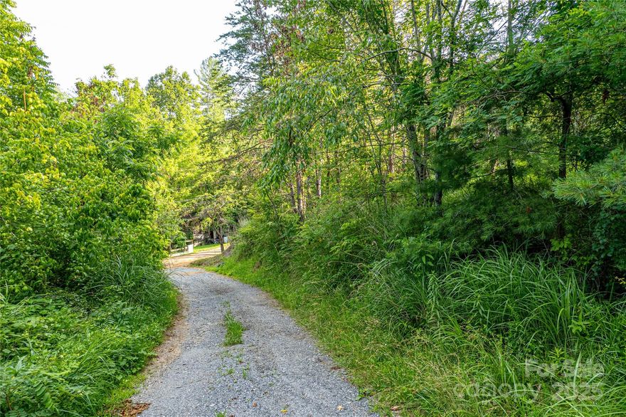 Endless possibilities with 5.44 acres of unrestricted WNC Mountain acreage.  This lot offers privacy and convenience.  Less that 4 minutes from I-26 and 10 minutes to Weaverville or Mars Hill.  You can also be in Asheville with an easy 19 minute drive on I-26.