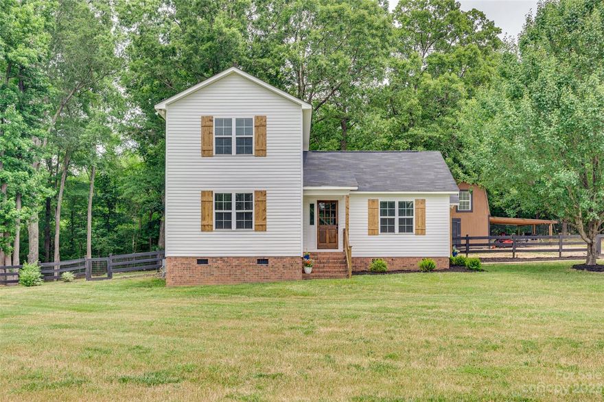 Welcome to this beautifully updated and well maintained 3 bedrooms, 2 bath home located at the end of a peaceful cul-de-sac. Nestled on a generous 1-acre lot, this property offers a tranquil setting with a private fenced in backyard with trees all around. Spacious living area with large eat in kitchen featuring a functional work island that provides ample counter space for meal preparation. A comfortable primary bedroom with en suite on the main level offers modern fixtures and finishes. The upper level consists of 2 bedrooms with full bath and bonus room that provides flexible space that can be used as a home office, playroom, or additional living area. Situated in the back of the property, you’ll find a spacious barn that offers an abundance of storage space. Whether you need a place to store outdoor equipment, hobby materials, or seasonal belongings, the versatile barn provides ample room to accommodate all your storage needs.