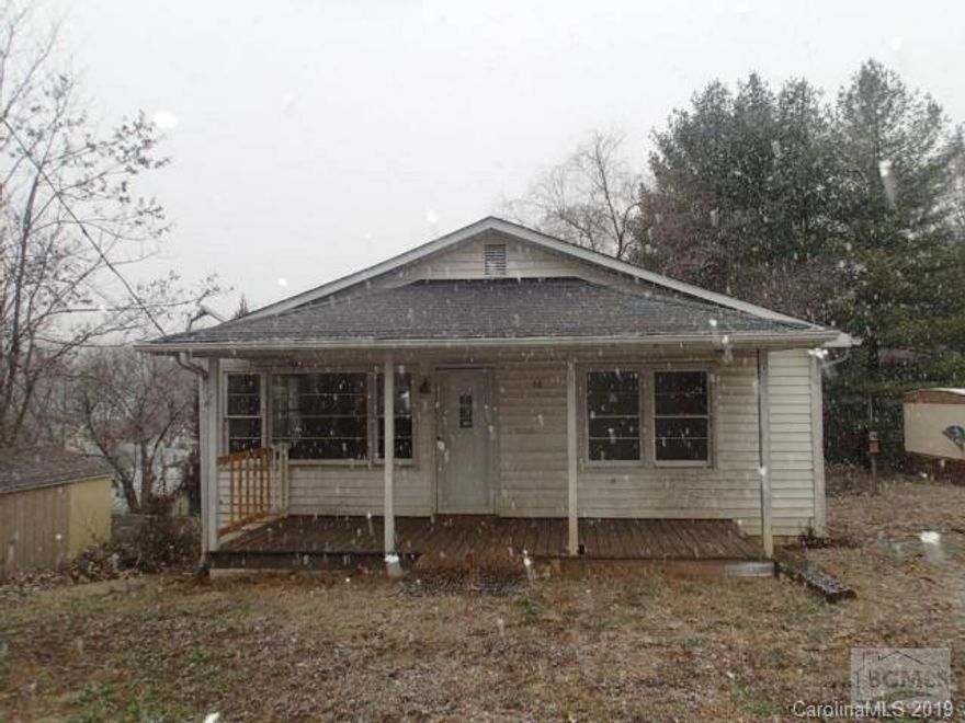 VERY AFFORDABLE MOVE-IN READY HOME IN MARION NC! Floorplan consists of a large living room, kitchen w bar and dining area, 3 bedrooms w a centrally located full bathroom,a laundry room, and a bonus room that could be used as a 4th sleeping area.Lots of tongue and groove paneling, hardwood flooring, and some updated fixtures. Low maint vinyl ext and 2 decks plus a covered front porch. Property is owned by US Dept of HUD and is sold AS-IS/WHERE-IS with all faults. Buyer or buyers agent to verify all stats. HUD Case#387-141759. Purchase this home using FHA Financing with only $100 DOWN! See your agent for details. Property is eligible for FHA Insured (IN) financing pending updated appraisal. Seller will contribute up to 3% of purchase price for buyers closing costs if requested with offer submission. EQUAL HOUSING OPPORTUNITY
