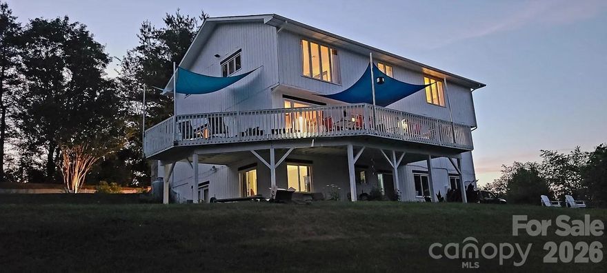 Spacious 7 bedroom 4 bath with breathtaking surround mountain views on private 1.3 acre lot in private subdivision. Located just 10 minutes from Asheville. Easy access to everything in the area. Huge Kitchen, large 2 story fireplace in grand room. All bedrooms are large with outstanding views. Wrap around deck and patio. All furnishings may be purchased at additional cost.